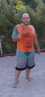 Cliente FitsLife após o treino na areia